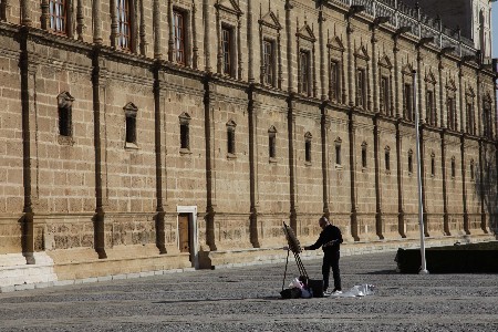 Un pintor plasmando la fachada del Parlamento
